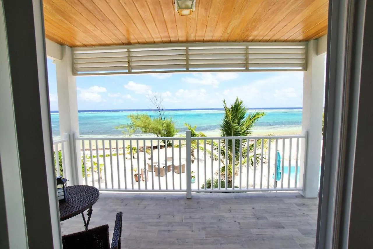 The Blue Iguana At Cottages Sand Bluff 0*,
